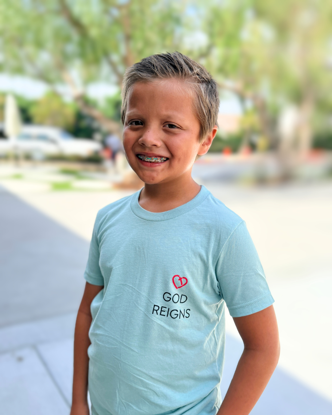God Reigns Youth Tee